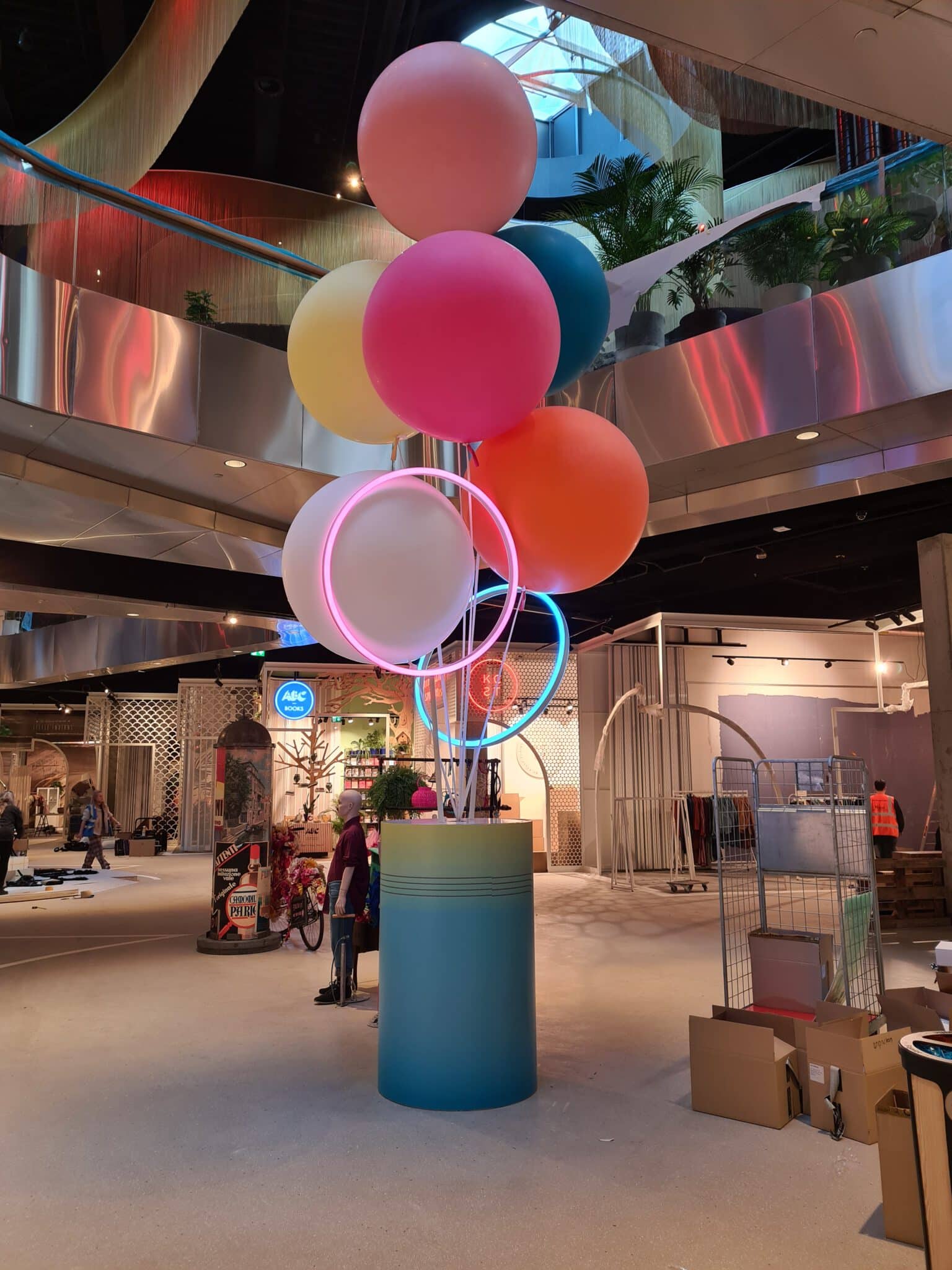 Colorful balloon installation with neon LED rings at Mall of the Netherlands — Stages of Air — Out of Thin Air